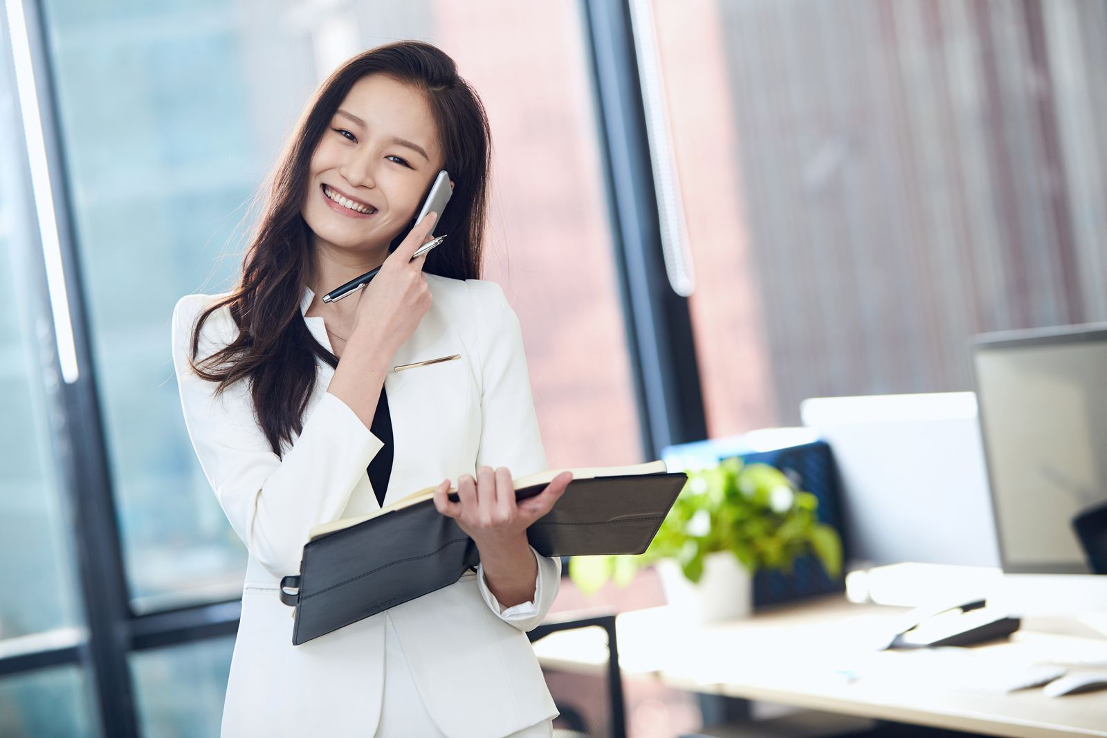 Marsiees sales professional on a call with a Japanese business contact